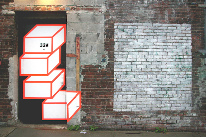 Relatively fresh street art made of tape by Aakash Nihalani. Photo by carnagenyc.