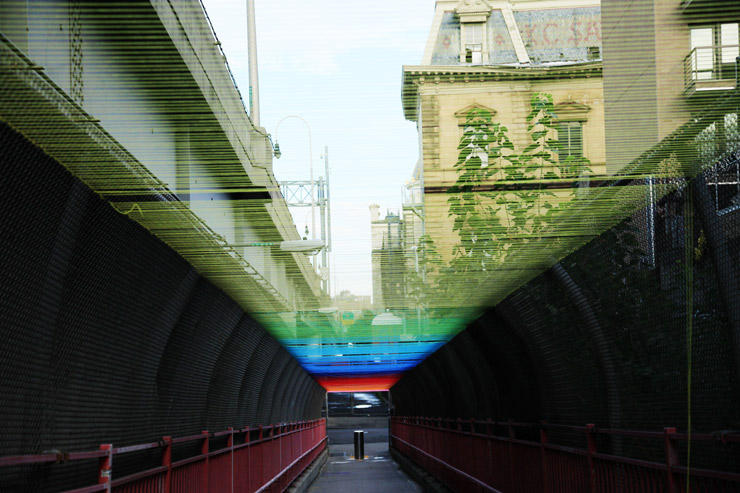 Hot Tea yarn bombed the pedestrian section of the Williamsburg Bridge. Photo by Jaime Rojo.
