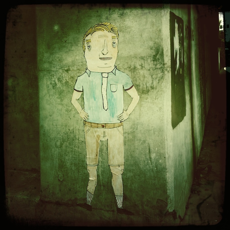 A wheatpaste by Don't Fret. The photo has been heavily manipulated in the Hipstamatic application. Photo by Seth Anderson.