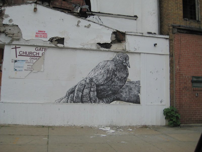 A wheatpaste by Gaia in Baltimore. Photo by Hank Mitchell.