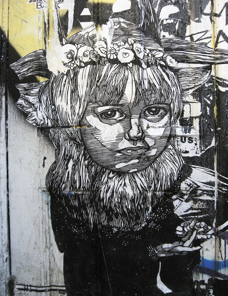 A wheatpaste by Gaia. Photo by shoehorn99.