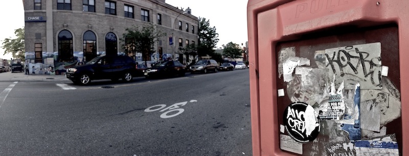 Handmade sticker by Cosbe along with other stickers. Photo by RJ Rushmore.